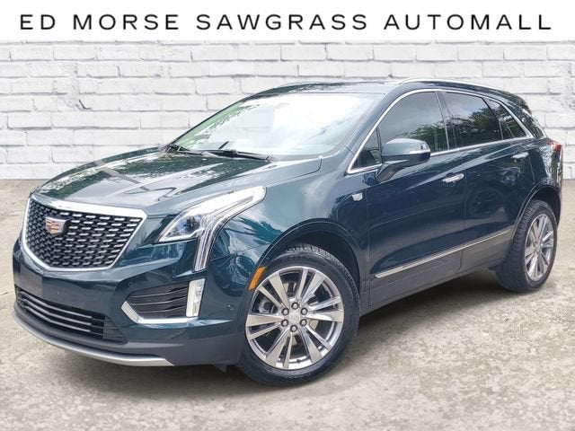 2024 Cadillac XT5 Premium Luxury in Emerald Lake Metallic — front three-quarter view