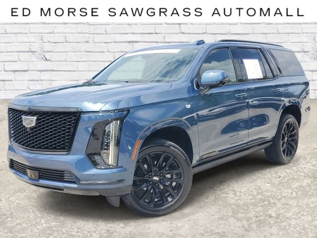 2026 Cadillac Escalade Sport in Deep Sea Metallic — front three-quarter view