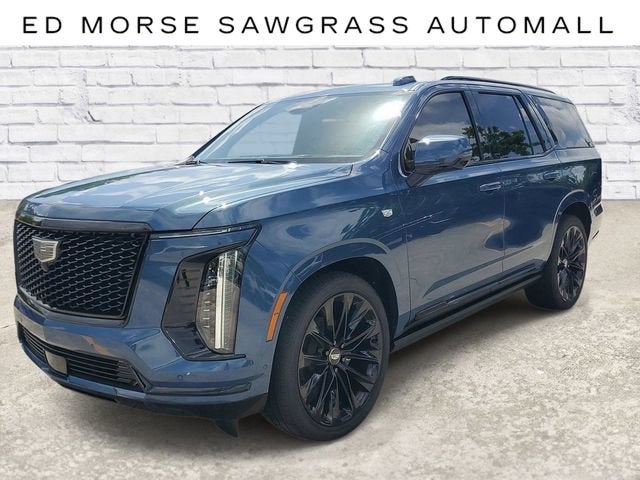 2026 Cadillac Escalade Platinum Sport in Deep Sea Metallic — front three-quarter view