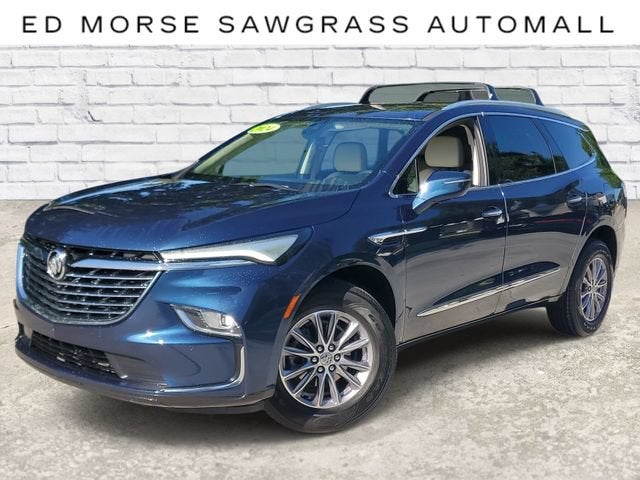 2024 Buick Enclave Essence in Emperor Blue Metallic — front three-quarter view