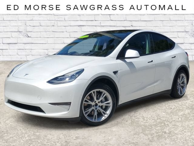 2021 Tesla Model Y Long Range in Yellow — front three-quarter view